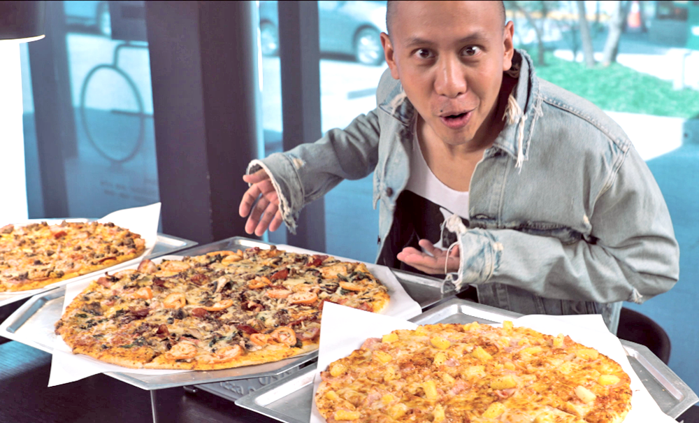 Mikey Bustos wants his pizza like that